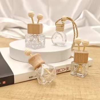 Modern Interior Car Air Outlet Aromatherapy Essential Oil Holder Empty Glass Perfume Bottle and Air Conditioning Balm Ornament